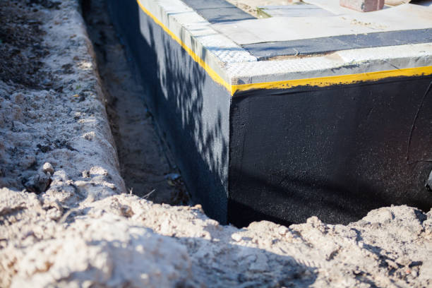 Professional Interior Drainage System technician working in Bergenfield, NJ